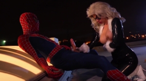 Blonde cougar dazzles with her huge tits while doing Spider Man