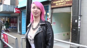 Pink haired babe Dolly Kitten showing her shaved pussy in public