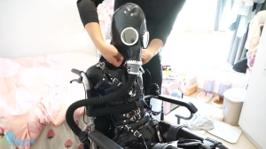Latex 014 Rubber Girl Wheelchair
