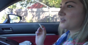 Amateur video of stranger Lily Adams smoking a cigar in the car